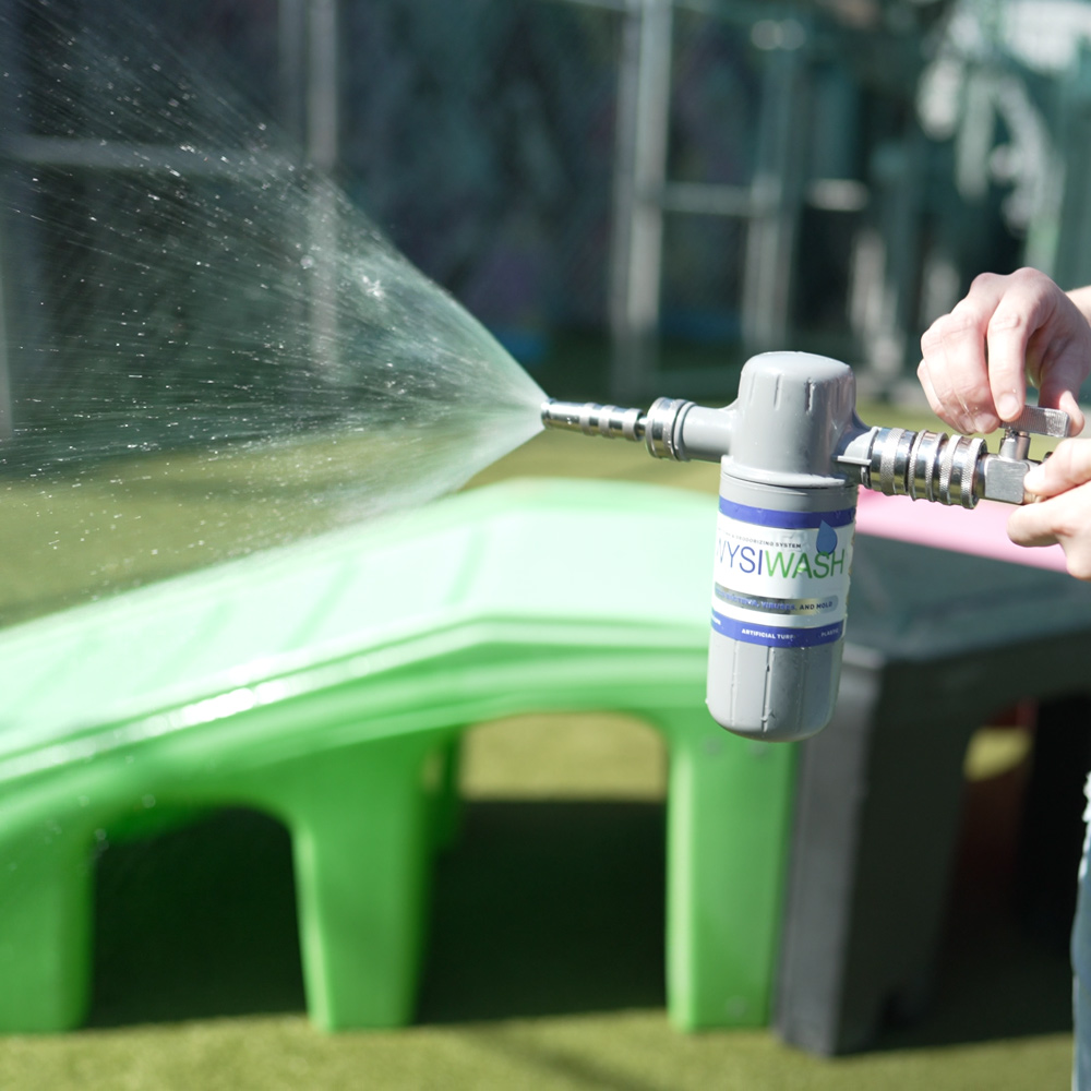 Wysiwash sanitizing spray on artificial turf and play equipment